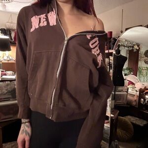 brown and pink new york zip up hoodie